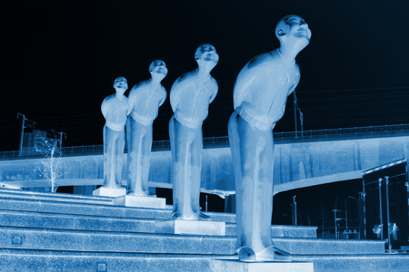 FENGNAN CITY - MARCH 30: Figure statue on the steps, March 30, 2014, Fengnan city, hebei province, China.のeditorial素材
