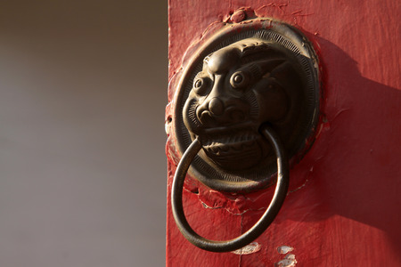 metal door knocker, closeup of photoの写真素材