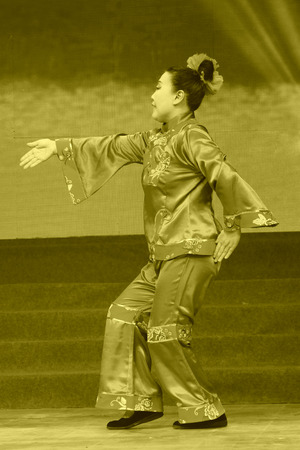 TANGSHAN - JANUARY 26: The ancient costume PingJu performance on stage, January 26, 2014, tangshan, china.のeditorial素材