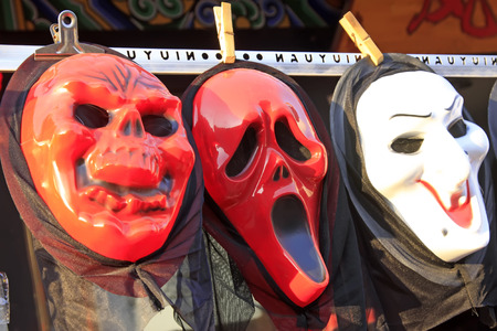 grimace masks in a stall, closeup of photoのeditorial素材