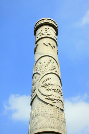 Totem poles in the sky, closeup of photoのeditorial素材
