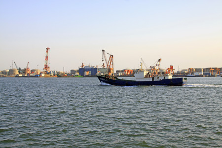 cargo ship in the port, closeup of photo