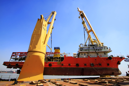 TIANJIN PORT - MARCH 23: seal 7 Exploration ship was hoisted in a large cargo ship, on March 23, 2015, tianjin port, tianjin, China.のeditorial素材
