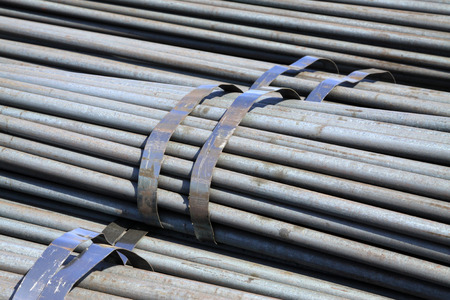 Round bar steel pile up together, closeup of photo