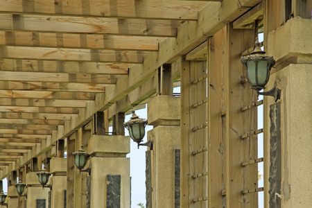 Wooden corridor in the park, closeup of photoの写真素材