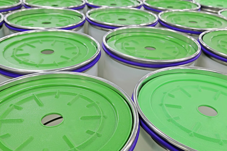 green cotton yarn barrels, closeup of photoの写真素材