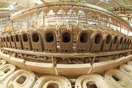 toilet unpainted clay idol in production workshop, closeup of photoのeditorial素材