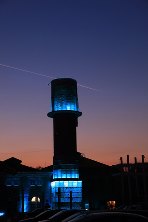 water tower under the setting sun, closeup of photoの写真素材
