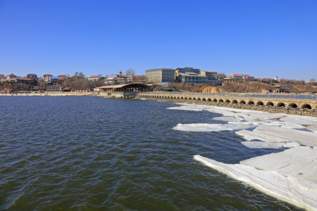 frozen sea and buildings, closeup of photoのeditorial素材