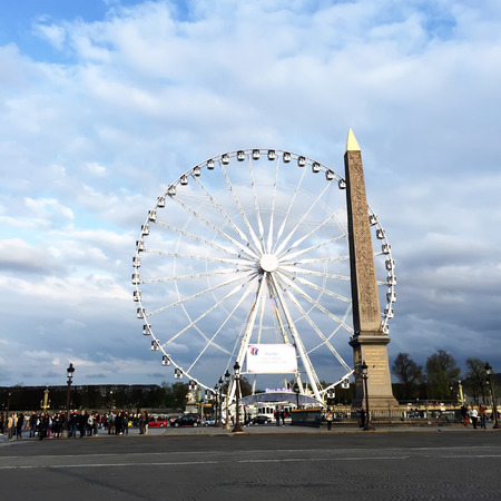 Paris - April 16: ferris wheel and obelisk of Egypt in the place DE la Concorde, on April 16, 2016, Paris, Franceのeditorial素材