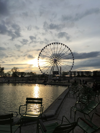 Paris - April 16: ferris wheel by the Seine on April 16, 2016, Paris, France