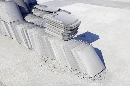 Gray tiles piled up togetherの写真素材