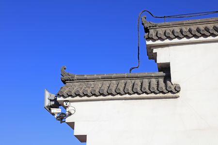 gray tiles and white Hui style architectureの写真素材