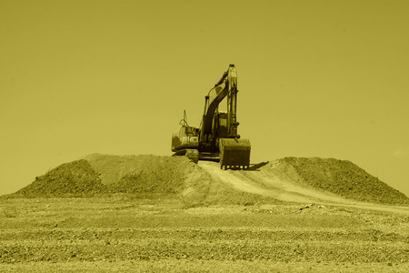 excavator in the construction site, closeup of photoの写真素材