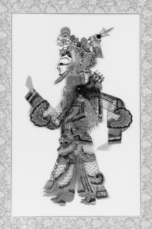 LUANNAN COUNTY - APRIL 24: Traditional Chinese style shadow puppet sculpture works in shops, on April 24, 2014, Luanan county, hebei, China.のeditorial素材