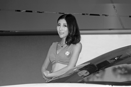 TANGSHAN - MAY 31: model in a car markets on may 31, 2014, Tangshan city, Hebei Province, Chinaのeditorial素材
