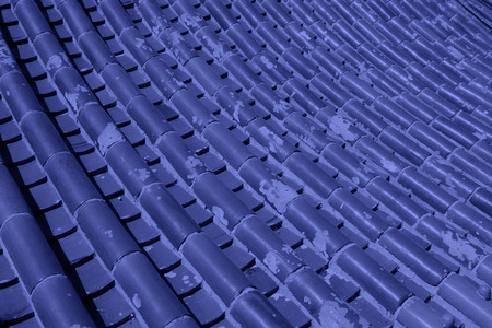 Chinese traditional style gray tiles roof, closeup of photoの写真素材