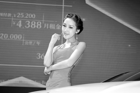 TANGSHAN - MAY 31: Beauty model in a car marketsï¼on may 31, 2014, Tangshan city, Hebei Province, Chinaのeditorial素材