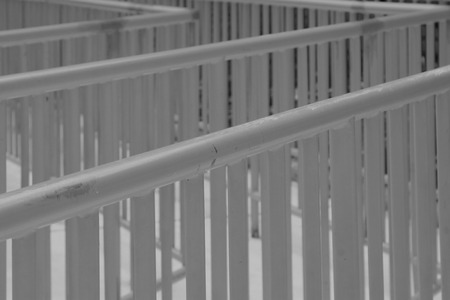 yellow metal railings in a playground, closeup of photoの写真素材