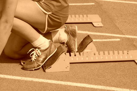 athletes debugging run up ware on plastic runway in a middle schoolの写真素材
