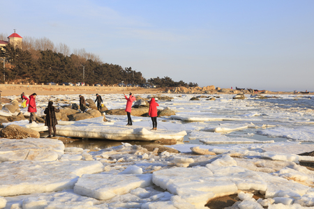 Qinhuangdao - Feb 9: people play on sea ice, February 9, 2016, qinhuangdao city, hebei province, Chinaのeditorial素材