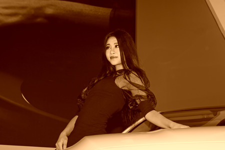 TANGSHAN - MAY 31: Beauty model in a car marketsï¼on may 31, 2014, Tangshan city, Hebei Province, Chinaのeditorial素材