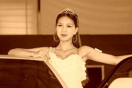 TANGSHAN - MAY 31: Beauty model in a car marketsï¼on may 31, 2014, Tangshan city, Hebei Province, Chinaのeditorial素材
