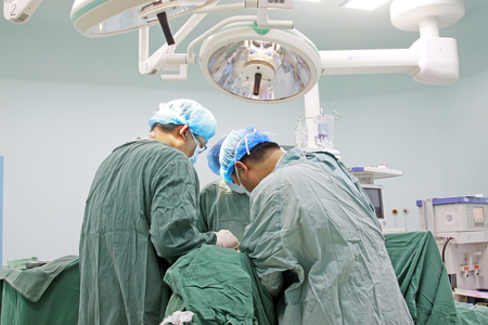 Luannan County - June 18th: medical staff in surgery, June 18th, 2015, Luannan County, Hebei Province, Chinaのeditorial素材