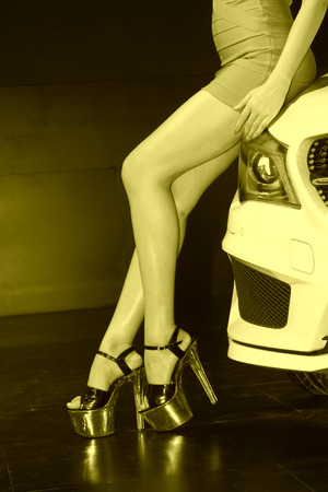 Beauty model dressed in black high heels, closeup of photoの写真素材