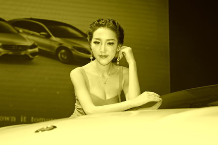 TANGSHAN - MAY 31: Beauty model in a car marketsï¼on may 31, 2014, Tangshan city, Hebei Province, Chinaのeditorial素材