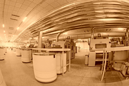 LUANNAN COUNTY - DECEMBER 20: The combed cotton production line and pipes in the ZeAo spinning LTD., on December 20, 2013, Luannan county, hebei province, China.のeditorial素材