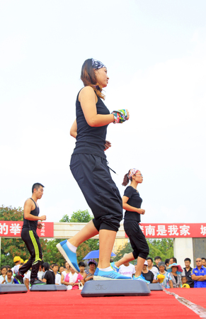 Luannan County - August 7: Step aerobics performances on the stage, on August 7, 2015, luannan county, hebei province, Chinaのeditorial素材