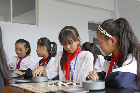 Luannan County - September 25: pupils learn to weiqi, Luannan County, Hebei Province, China, September 25, 2015のeditorial素材