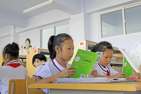Luannan County - September 25: pupils reading in the reading room, Luannan County, Hebei Province, China, September 25, 2015のeditorial素材