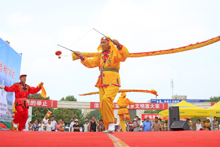 Luannan County - August 7: Diabolo performing, on August 7, 2015, luannan county, hebei province, Chinaのeditorial素材