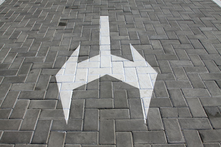 Point to tag, traffic signs on the asphalt roadの写真素材