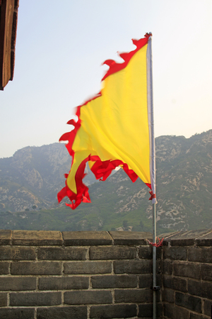 yellow flag on the wall, ancient Chinese architectureのeditorial素材