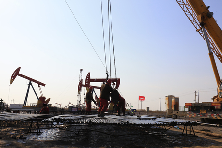 oil workers are in the drilling areaのeditorial素材