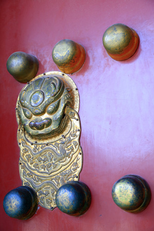 bronze animal Head Knocker on the doorの写真素材