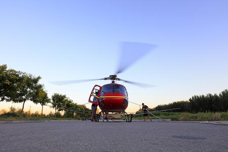 Luannan County - September 3, 2018: Agricultural helicopters are loading fuel and pesticides on highways, Luannan County, Hebei Province, Chinaのeditorial素材