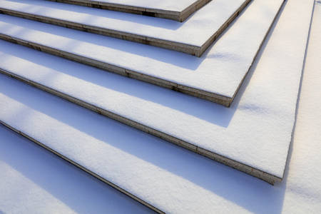 Snow covered stepsの写真素材