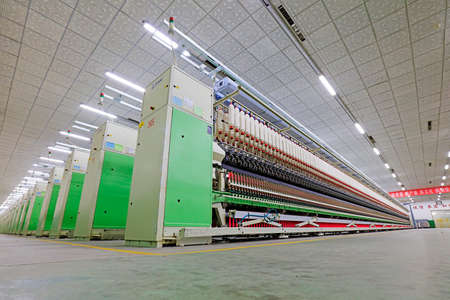 Spinning machine equipment in the workshopのeditorial素材