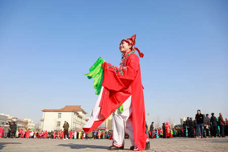 Luannan County-February 25, 2018: Yangge Dance Performance on the square, Luannan County, Hebei Province, China.のeditorial素材