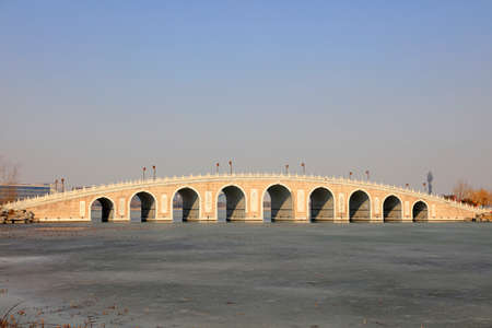 Architectural Scenery of Stone Arch Bridge in Chinaの写真素材
