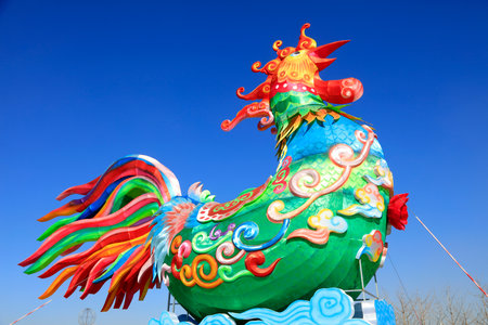 Rooster sculpture in the parkの写真素材