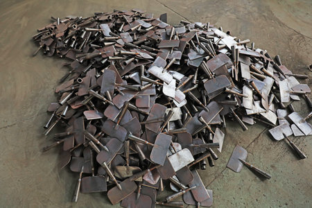 Semi-finished hardware tools are piled up in the production workshop
