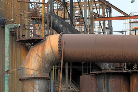 Unused and abandoned metal pipes in factories