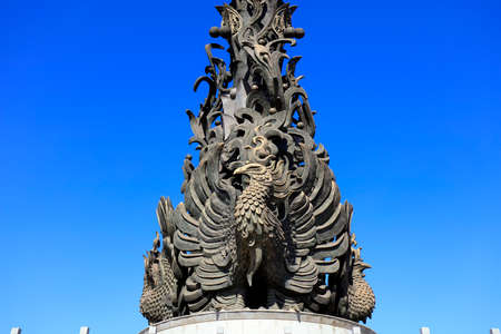 Tangshan City-February 11, 2017: Phoenix Sculpture in the Park, Tangshan City, Hebei Province, Chinaのeditorial素材
