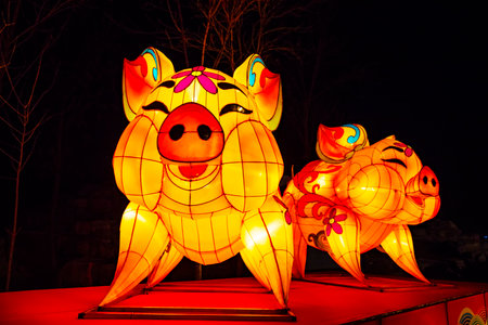 Tangshan City-February 8, 2019: cartoon figure sculpture in the night, Tangshan City, Hebei Province, Chinaのeditorial素材