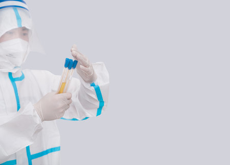 Doctor wearing protective suit medical imageの写真素材